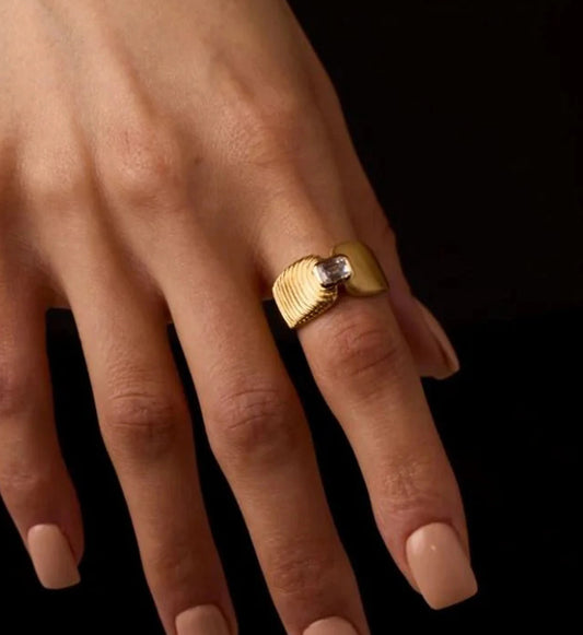 Gold tarnish-free Aurelia Ring on a model's hand by Liora Senar