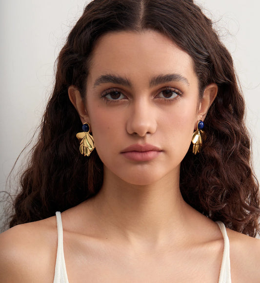 Stainless steel jewelry lapis flora earrings on a model minimalist by Liora Senar