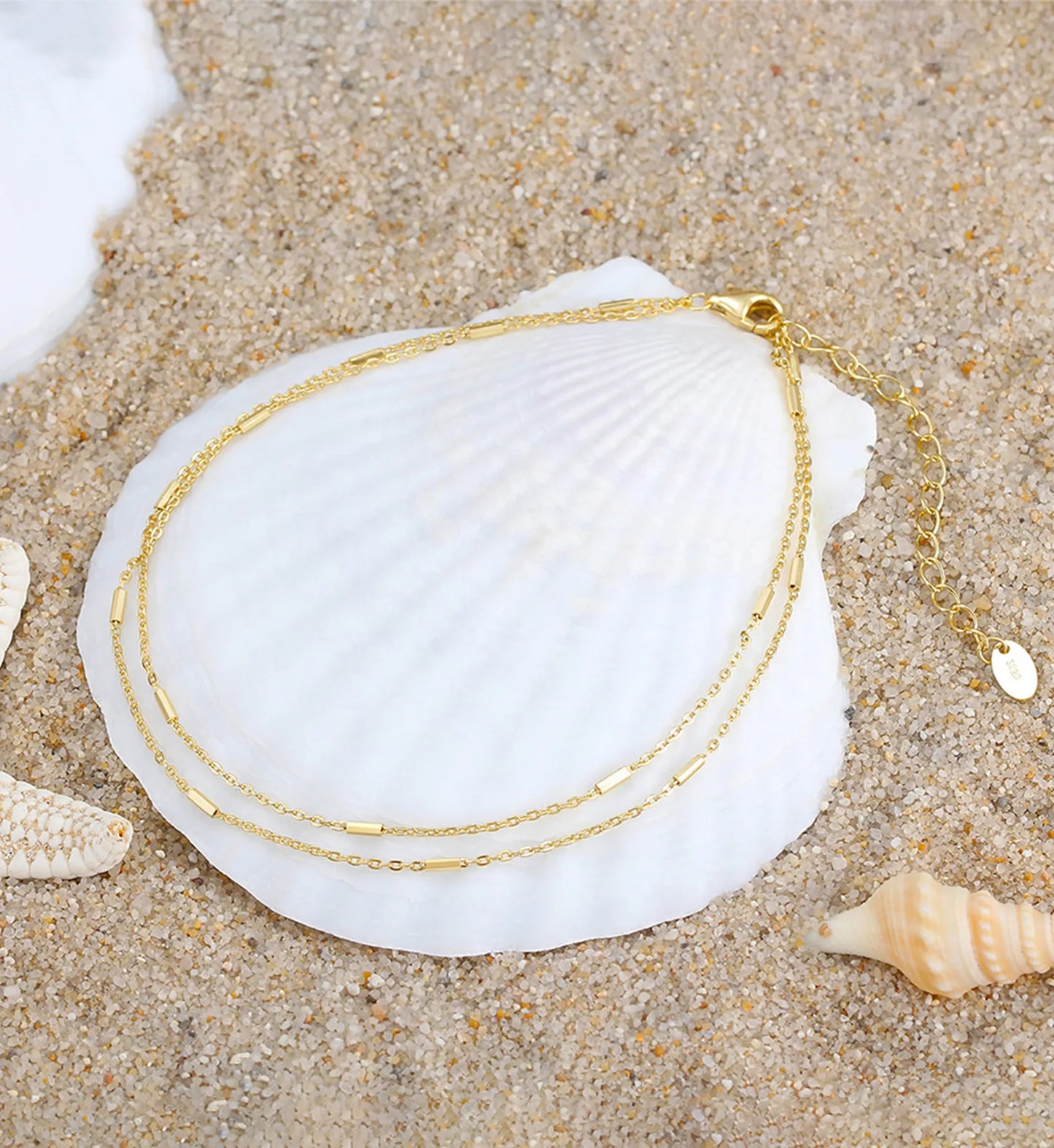 Gold 925 sterling silver minimalist ocean layered anklet on shell by Liora Senar