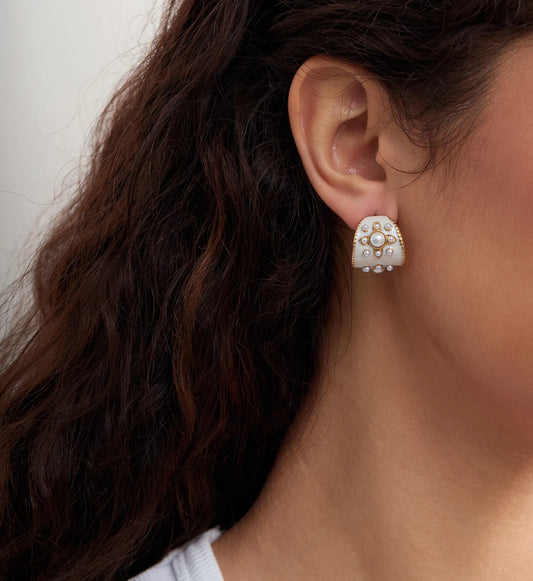 Model wearing hypoallergenic Vintage Drip Oil Pearl Earrings by Liora Senar