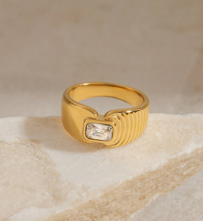 Gold minimalist Aurelia Ring on stone by Liora Senar