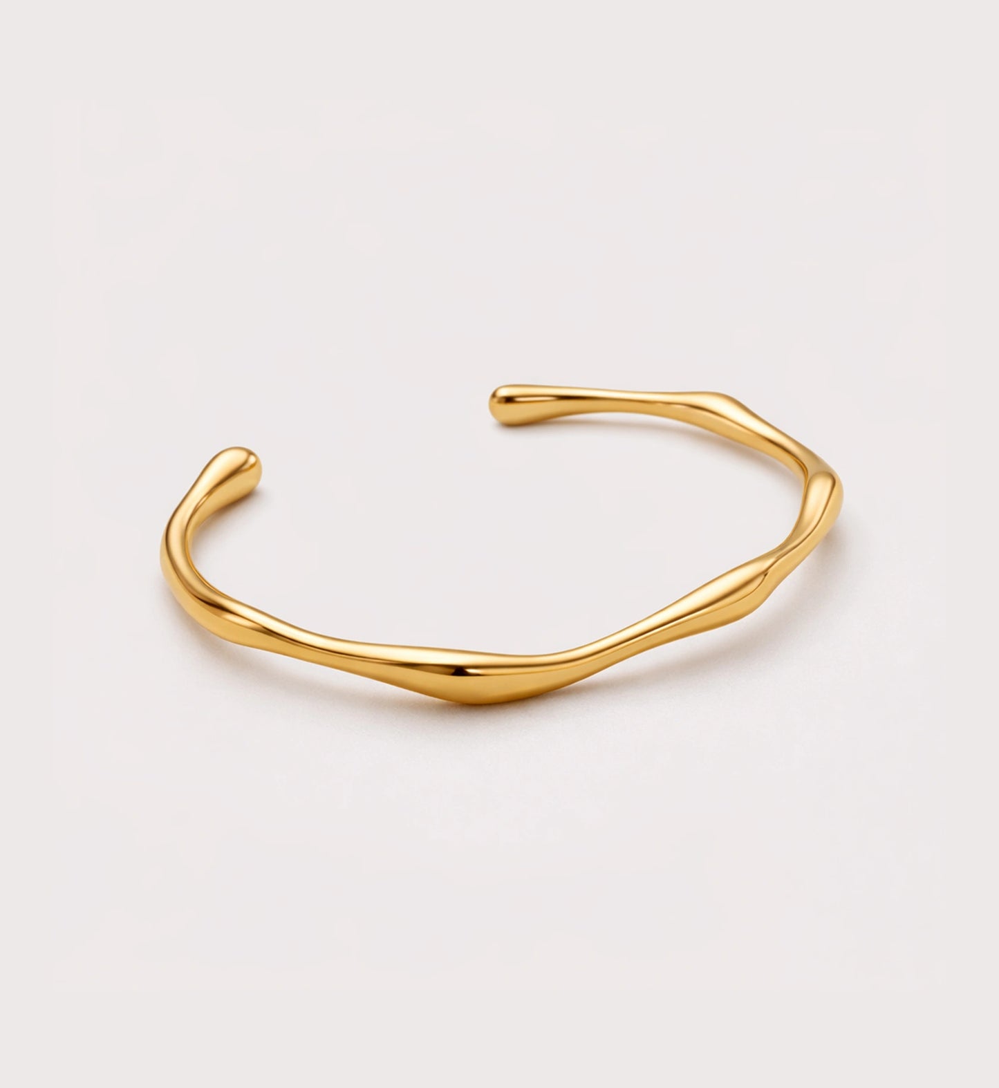 Liora Senar gold Aurelian Flow Cuff on white background