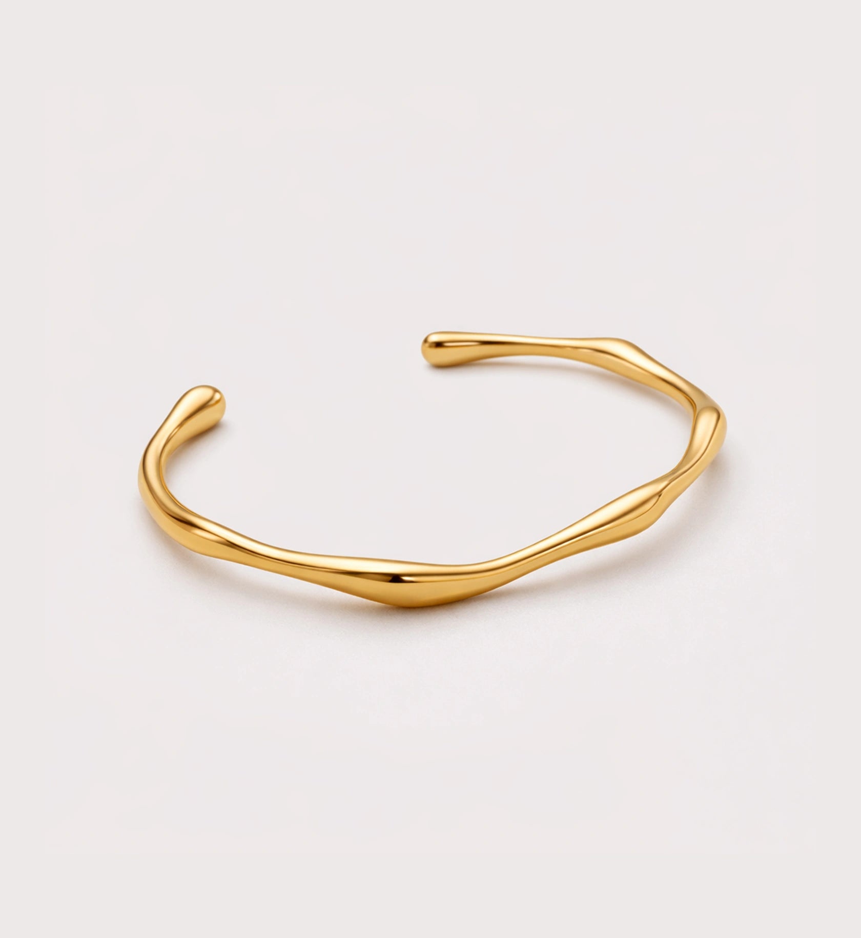 Liora Senar gold Aurelian Flow Cuff on white background