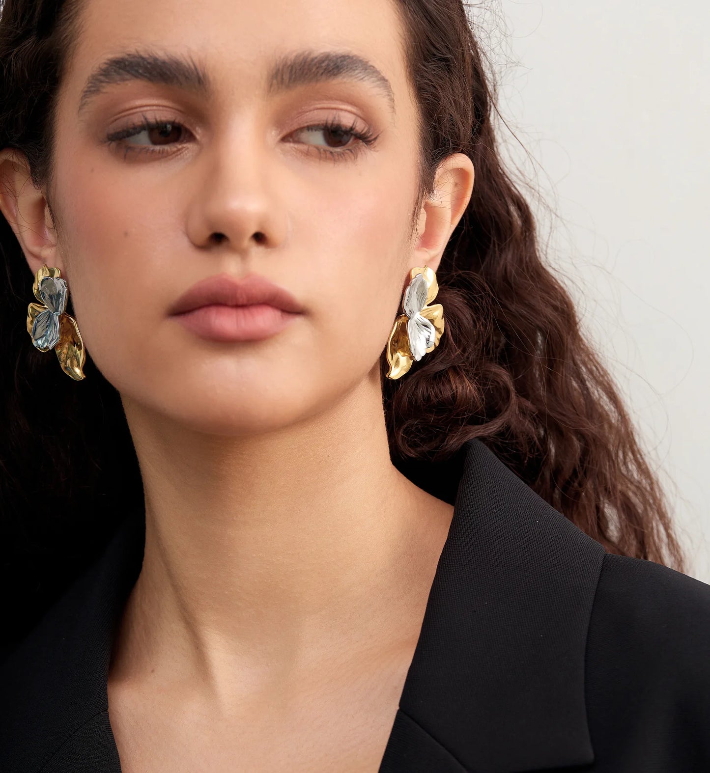 Color warranty Bi-Color Blossom Earrings on a model  by Liora Senar