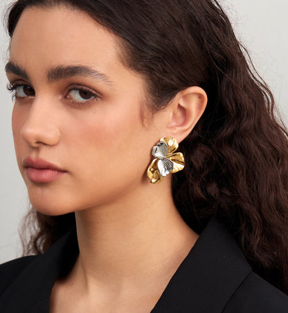 Model wearing stainless steel hypoallergenic Bi-Color Blossom Earrings by Liora Senar