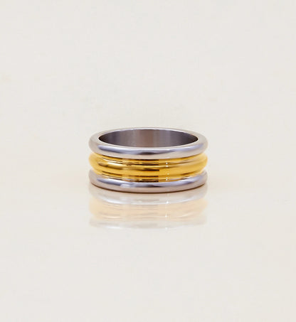 Minimalist stainless steel Bi-Stream Band Ring in light gray background by Liora Senar