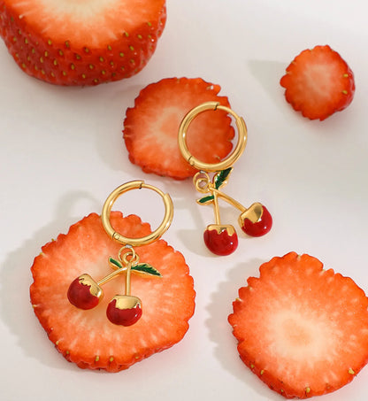 Close-up shot of hypoallergenic cherry kiss hoop earrings by Liora Senar