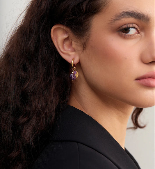 Model wearing hypoallergenic Eden Natural Stone Hoops by Liora Senar