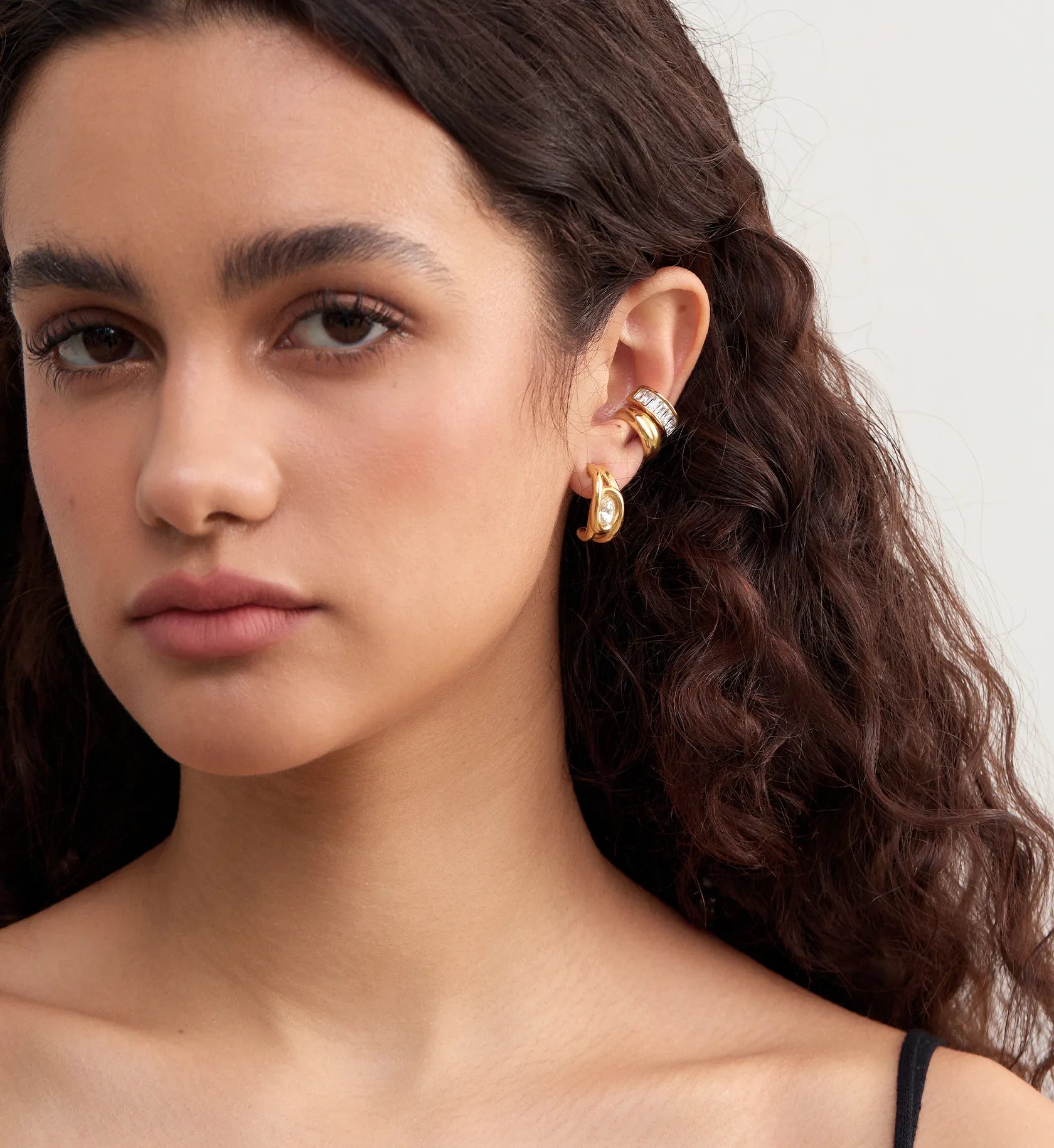 Model wearing waterproof hypoallergenic Gold Luna Cuff by Liora Senar