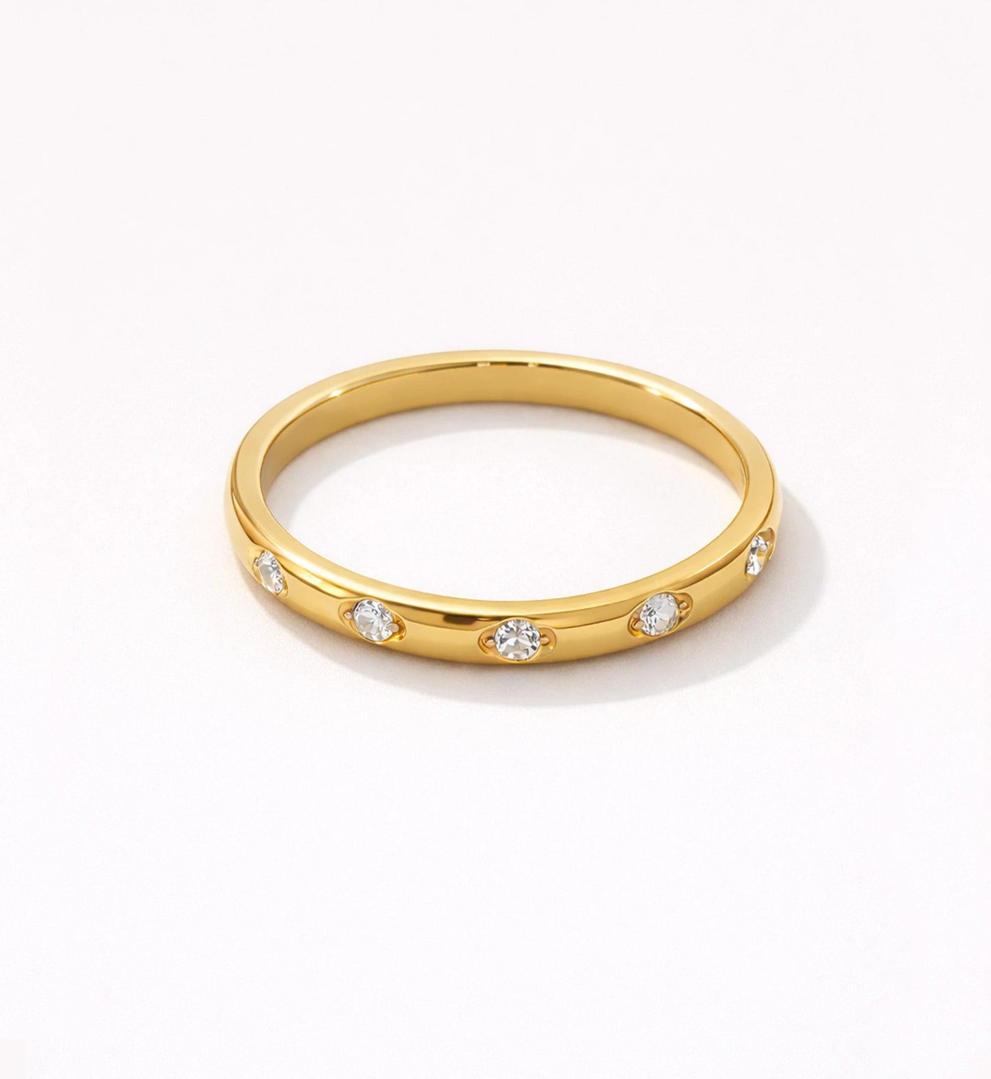 Gold minimalist Eterna Dot Ring on white  background by Liora Senar