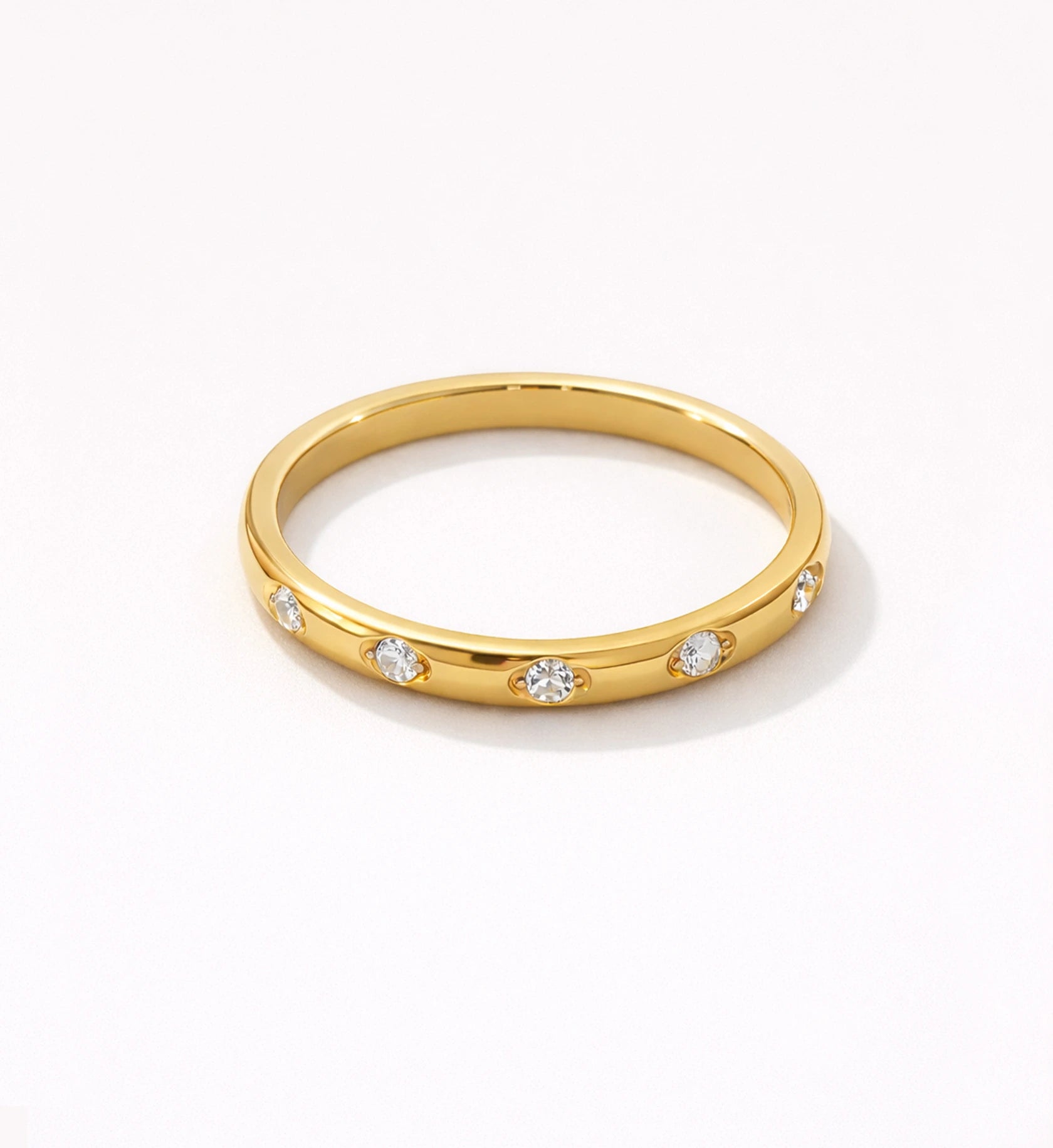 Gold minimalist Eterna Dot Ring on white  background by Liora Senar