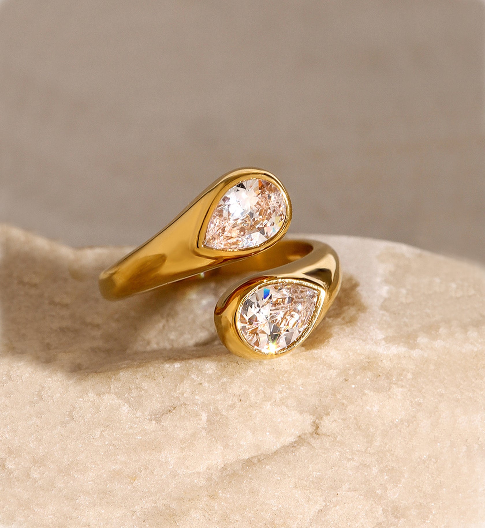 Gold tarnish-free Ethereal Drop Ring on stone by Liora Senar