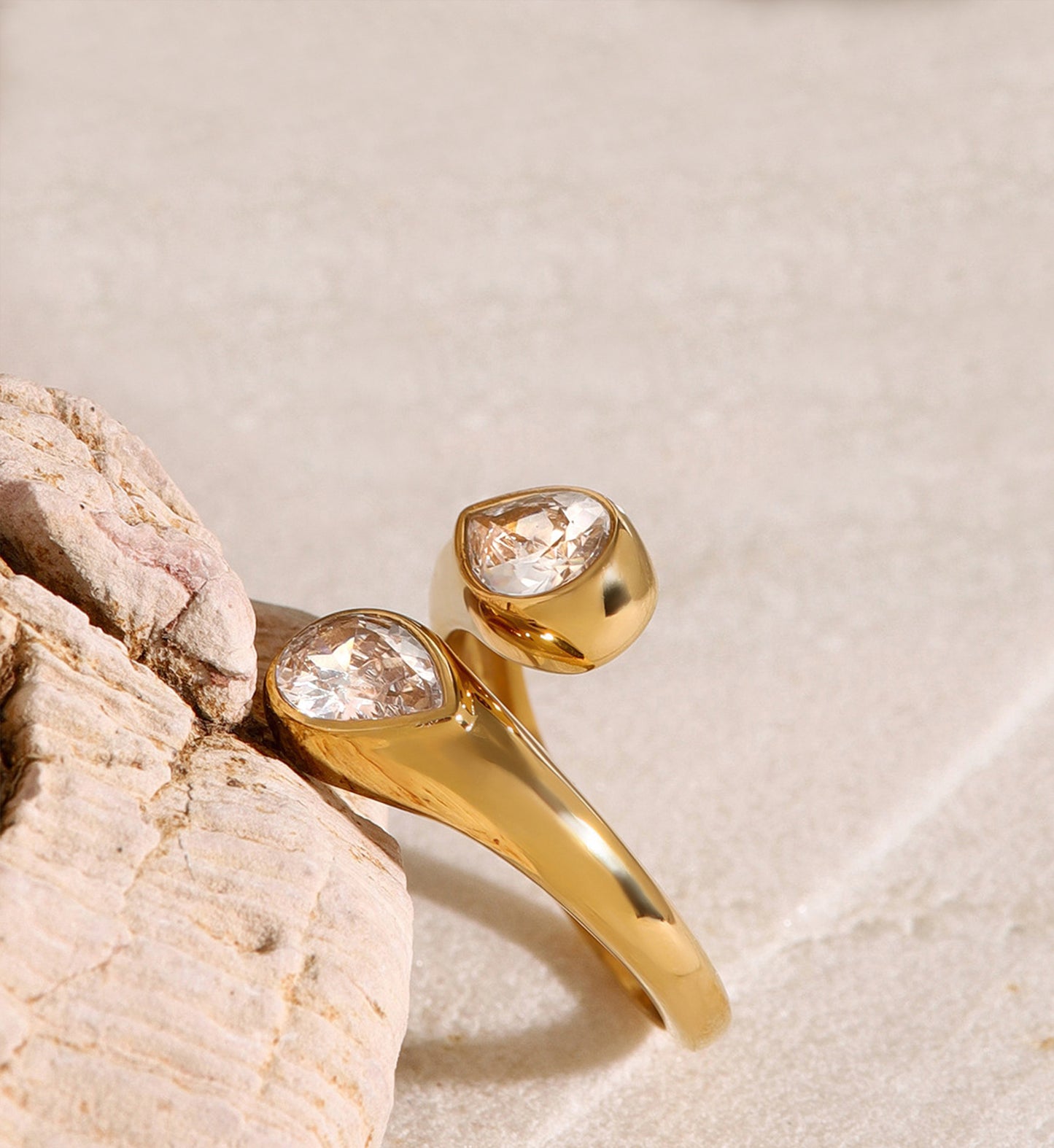 Gold color warranty Ethereal Drop Ring stand by a stone by Liora Senar