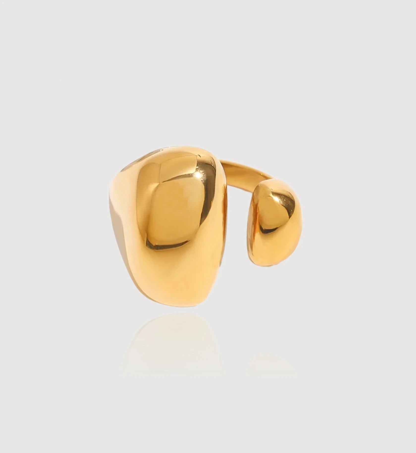 Gold color waterproof Geo-Hue Ring in light gray background by Liora Senar