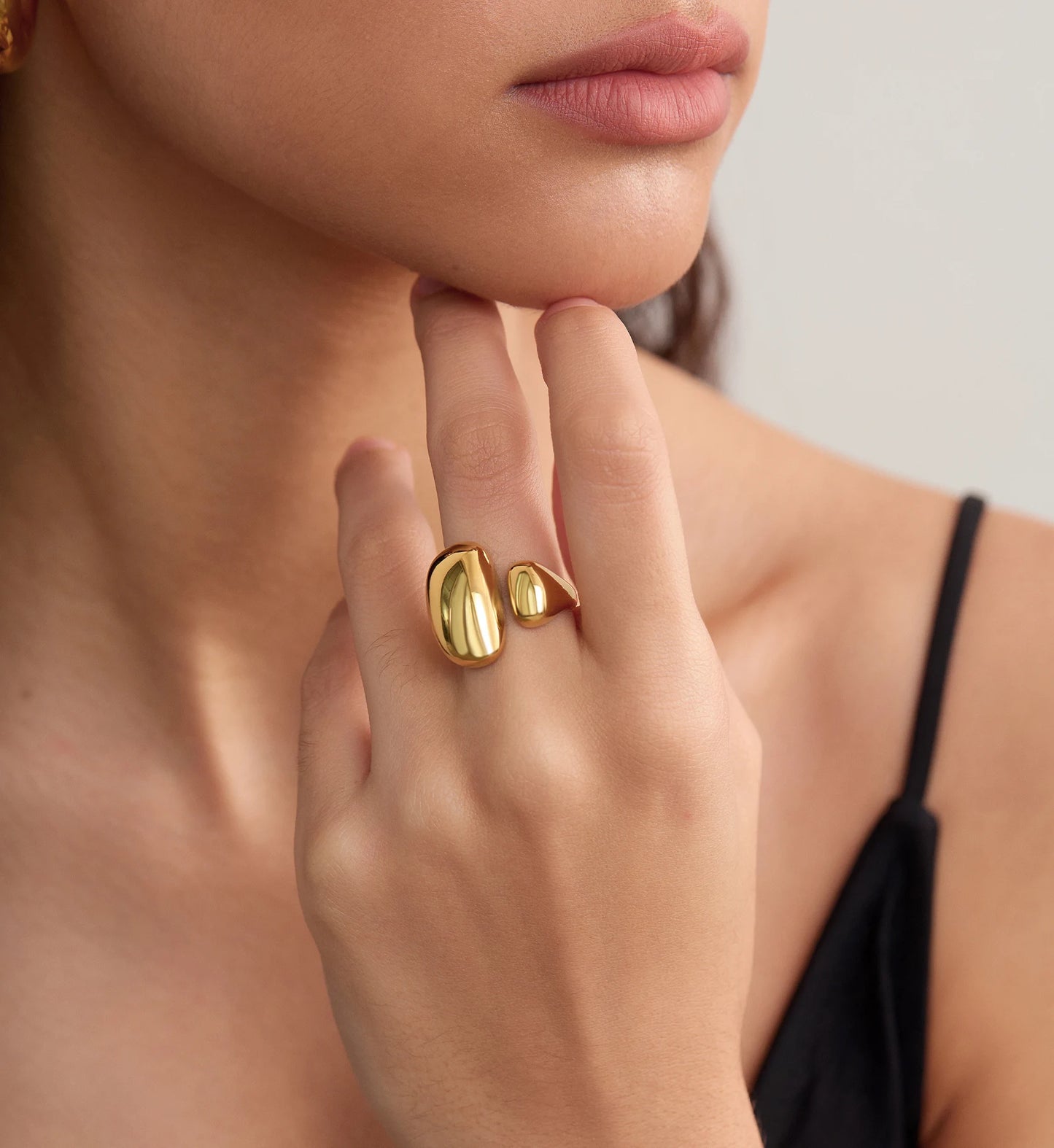 Model wearing Gold color warranty Geo-Hue Ring  by Liora Senar