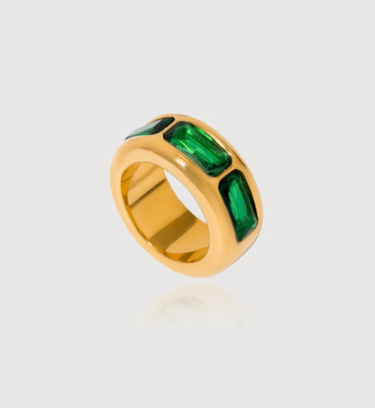 Emerald zirconia Geo Lumina Ring in light gray background by Liora Senar
