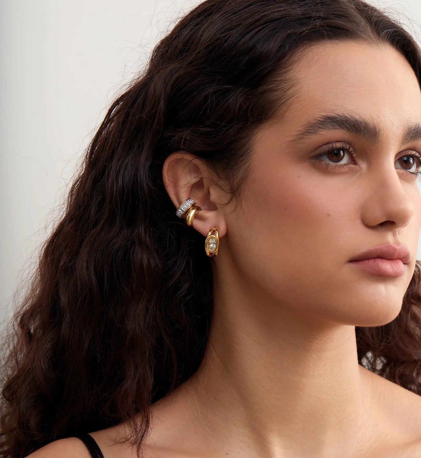 Model wearing Gold Gilded Sparkle Earrings Bundle by Liora Senar