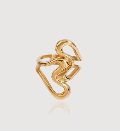 Gold stainless steel Heart To Heart Ring in light gray background by Liora Senar