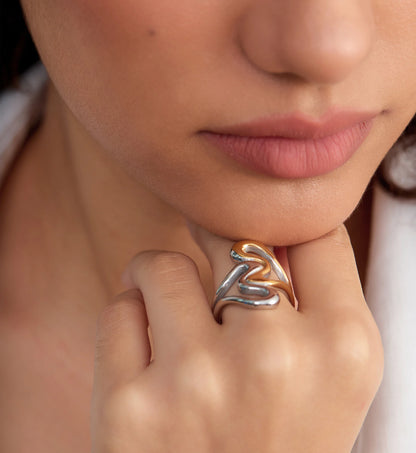 Close-up image of model wearing tarnish-free Heart To Heart Ring by Liora Senar