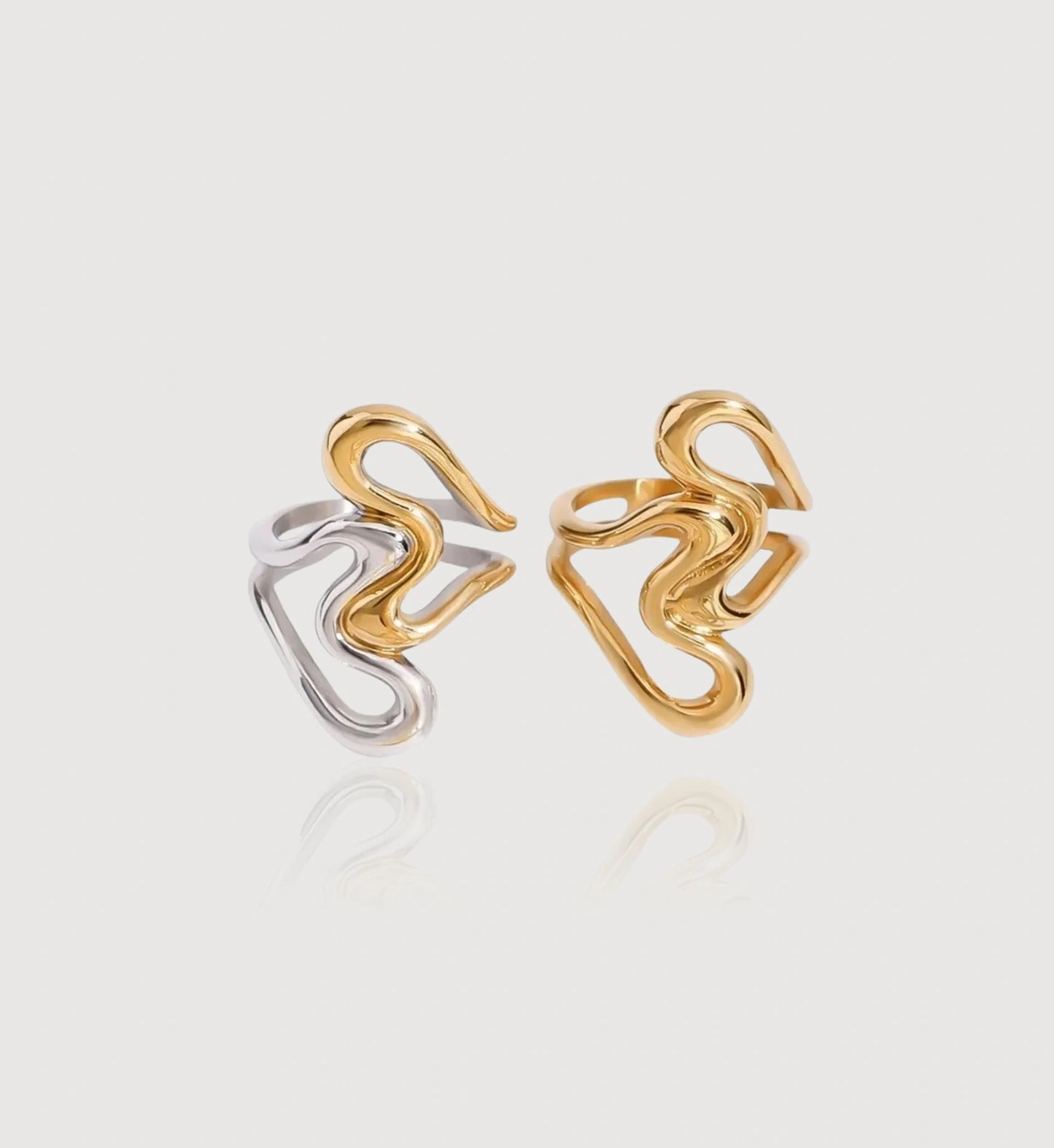 2 pieces of waterproof stainless steel Heart To Heart Ring in light gray bacbackground by Liora Senar