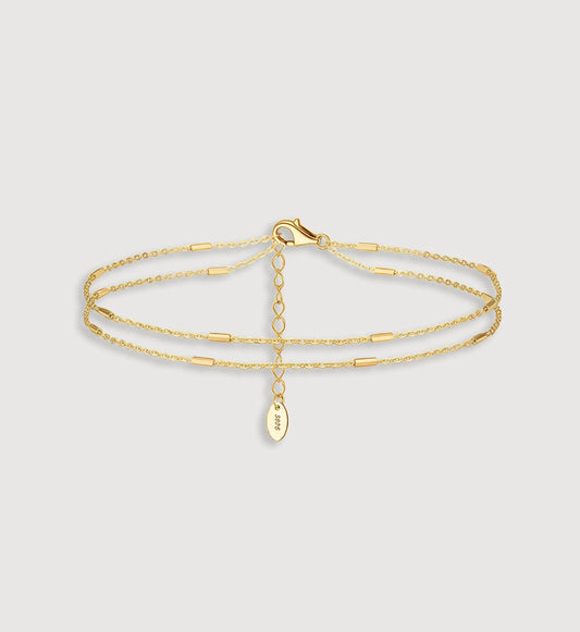 Gold 925 sterling silver Ocean Layered Anklet in light gray background by Liora Senar