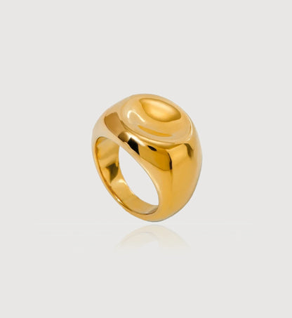 Gold tarnish-free Orb Lust Ring in light gray background by Liora Senar