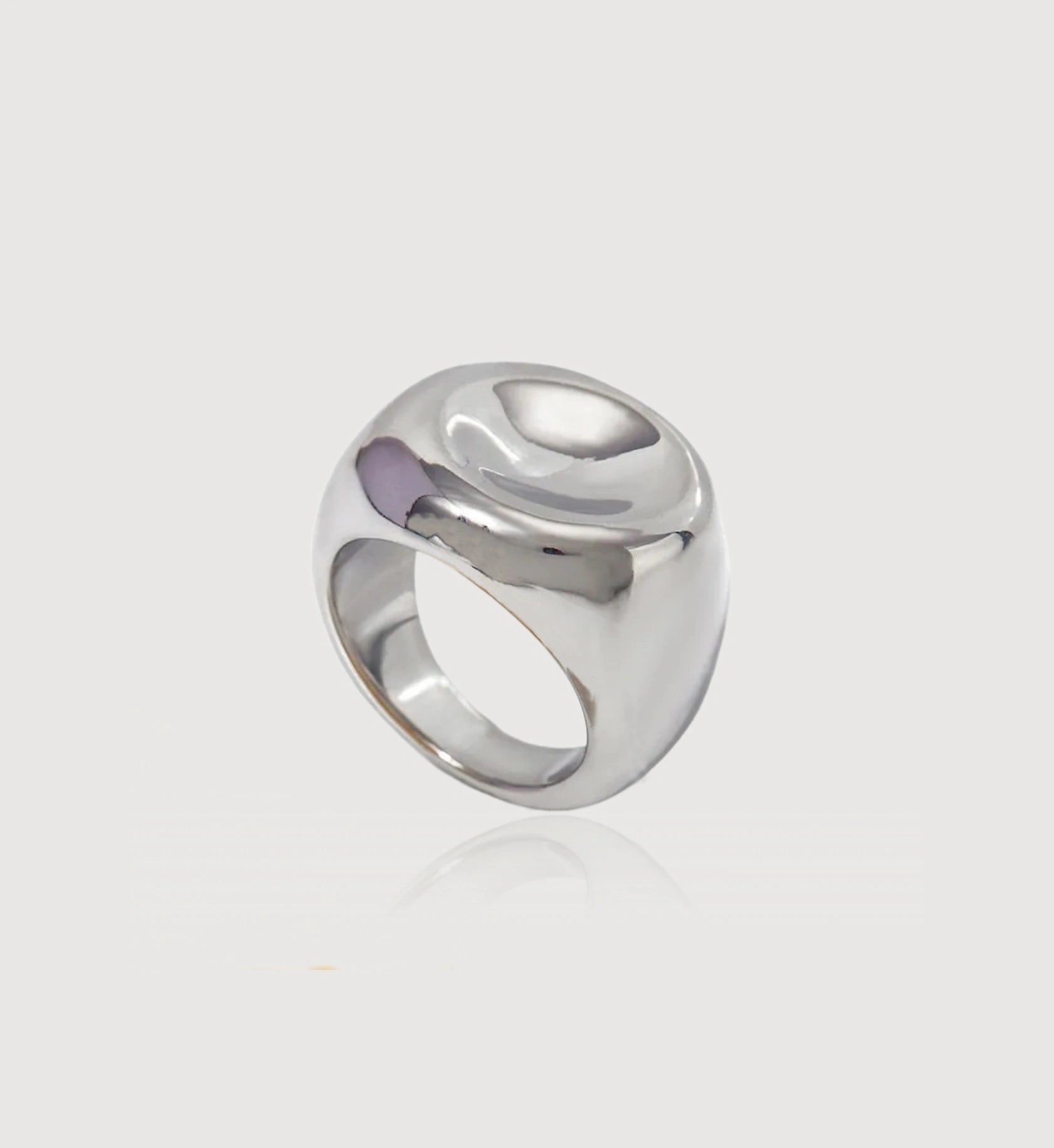 Silver color tarnish-free Orb Lust Ring in light gray background by Liora Senar