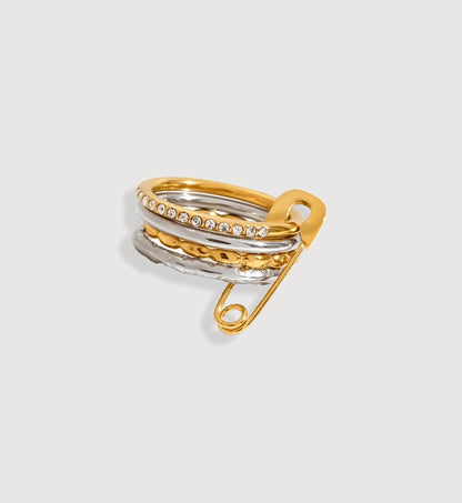 Gold silver two-tone color Pin Stack Ring Set in light gray background by Liora Senar