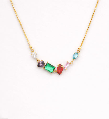 Liora Senar rainbow birthstone gold necklace on neutral background