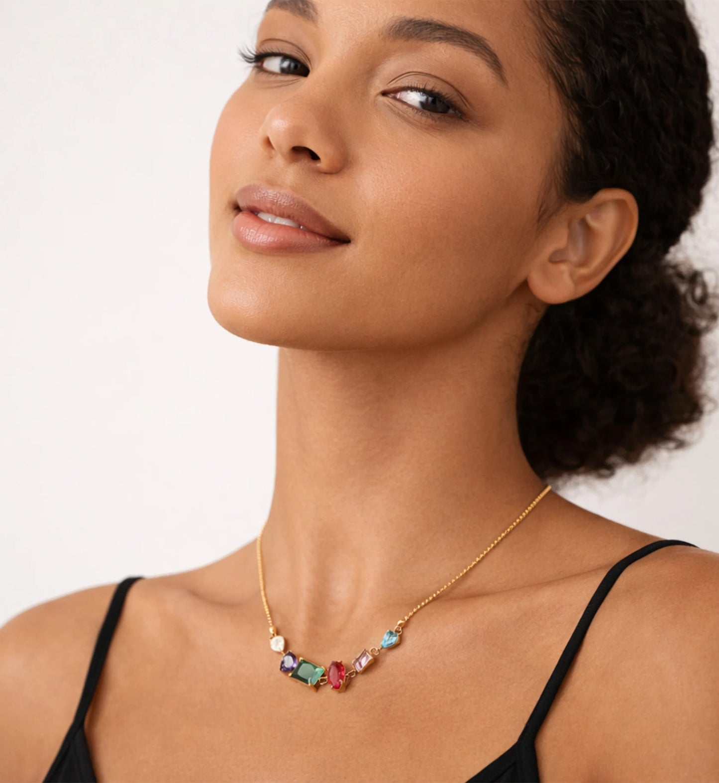Liora Senar colorful gemstone necklace worn with black camisole