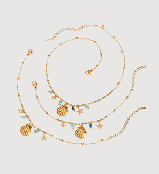 Gold waterproof Seashell Star Necklace and Bracelet Bundle in light gray background by Liora Senar