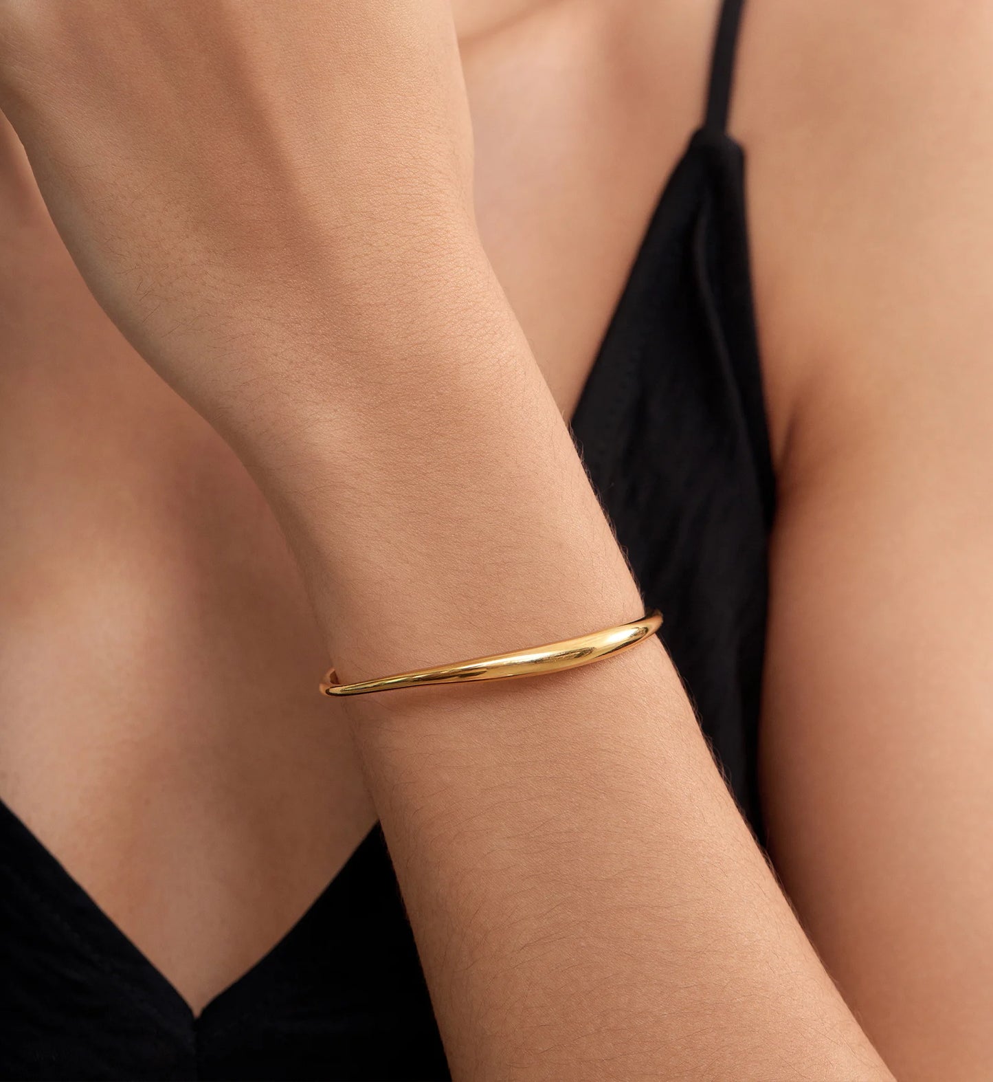 Sleek Curve Gold Cuff
