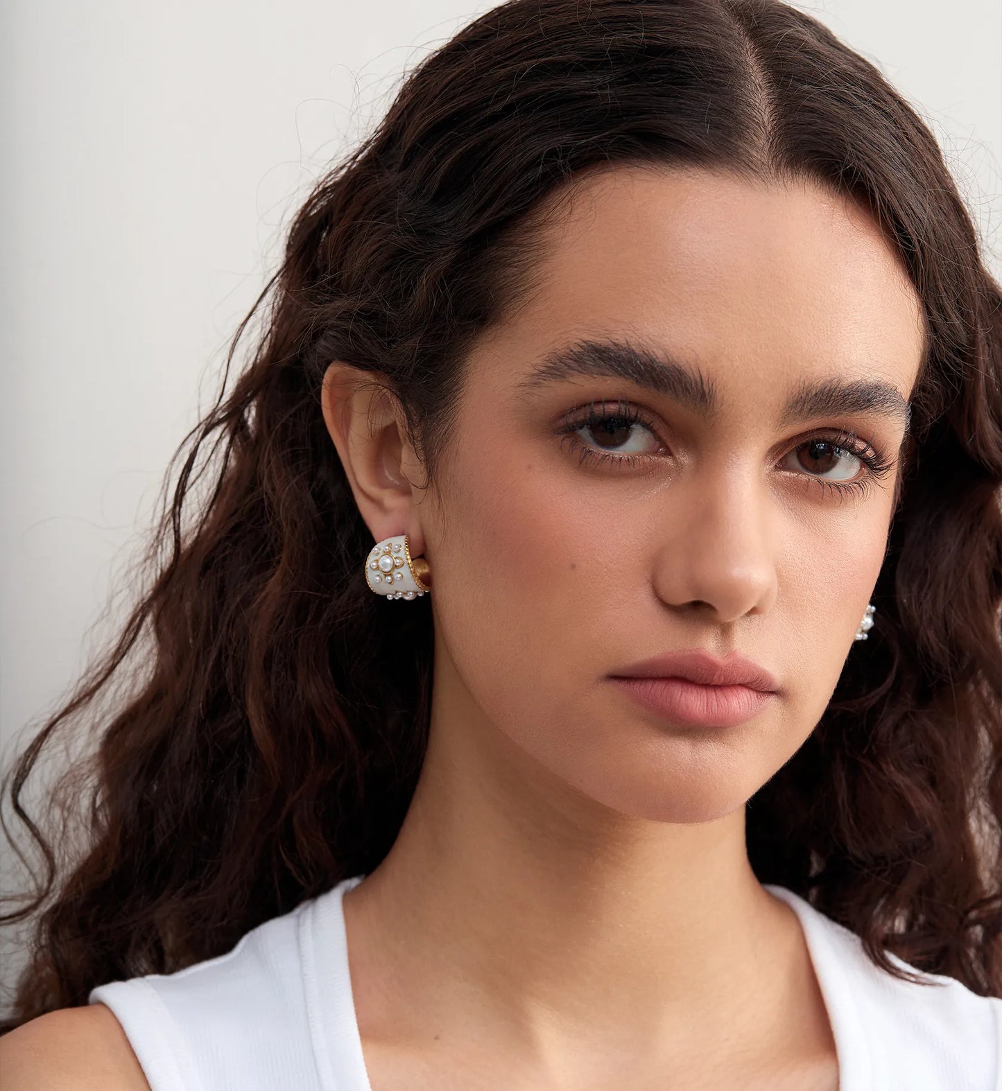 Tarnish-free vintage drip oil pearl earrings on model by Liora Senar